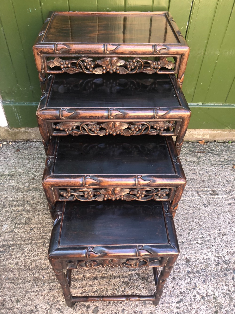 Nest of 4 late C19th Chinese Qing Dynasty carved hardwood graduated tables. View X