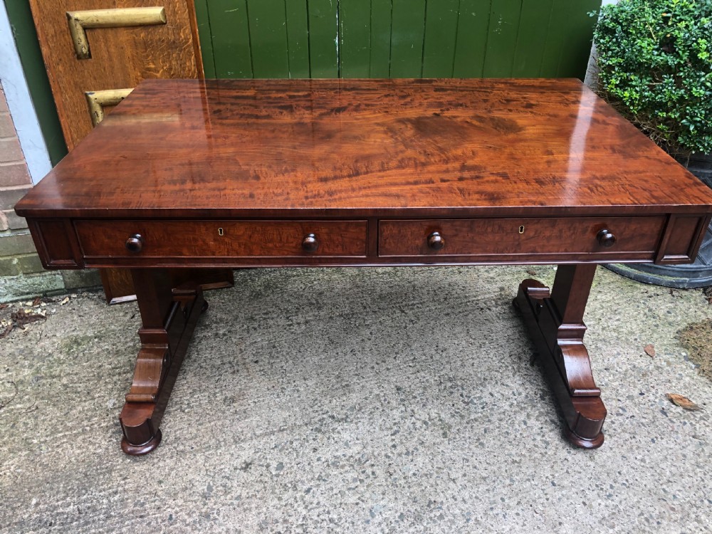 Early C19th George IV period mahogany library or writing table of free-standing form . View II