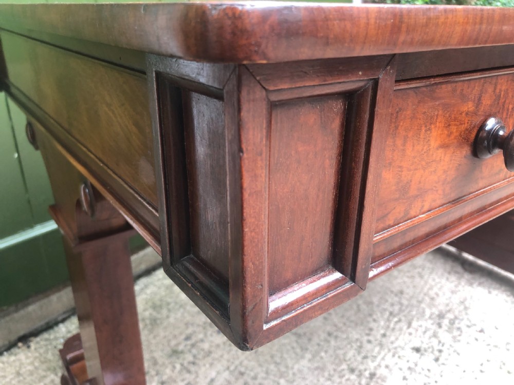 Early C19th George IV period mahogany library or writing table of free-standing form . View VII