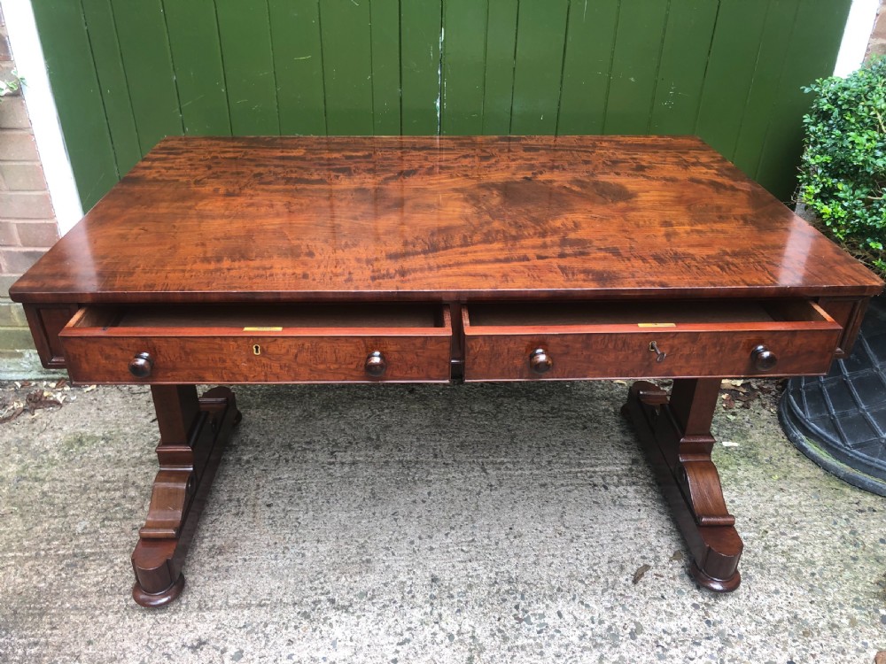 Early C19th George IV period mahogany library or writing table of free-standing form . View IX