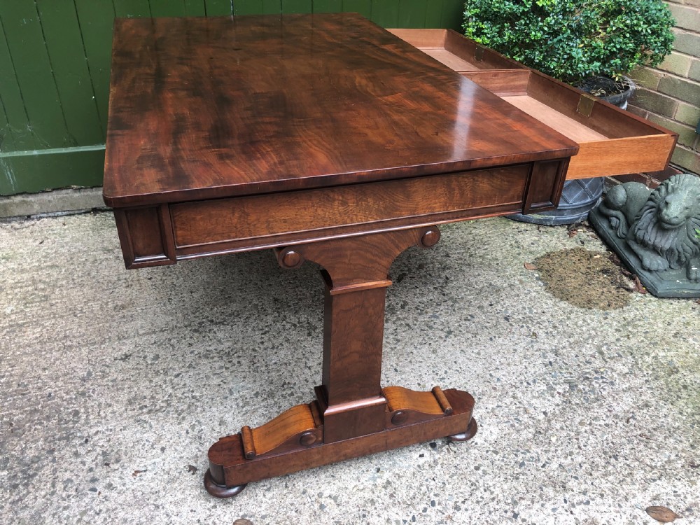 Early C19th George IV period mahogany library or writing table of free-standing form . View XVI