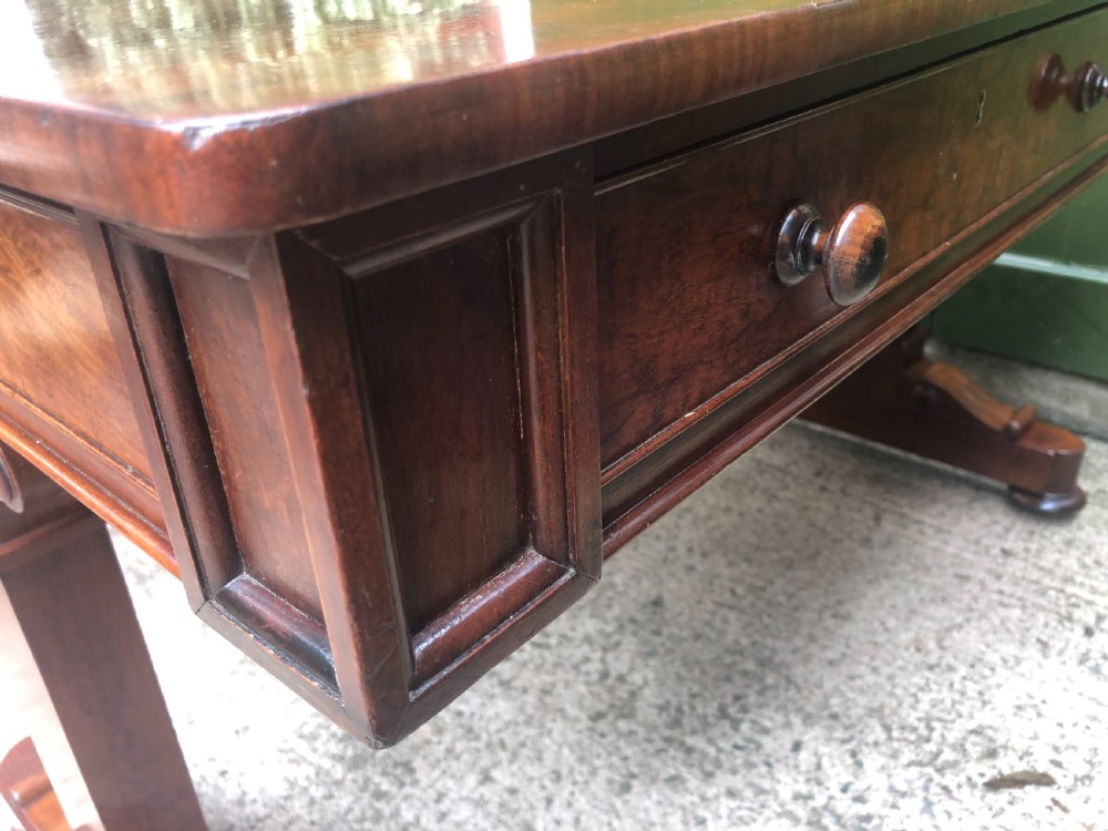 Early C19th George IV period mahogany library or writing table of free-standing form . View XVIII