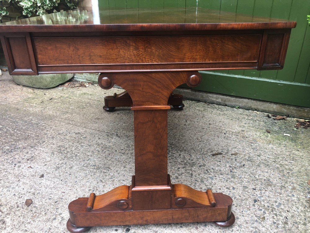 Early C19th George IV period mahogany library or writing table of free-standing form . View XXI