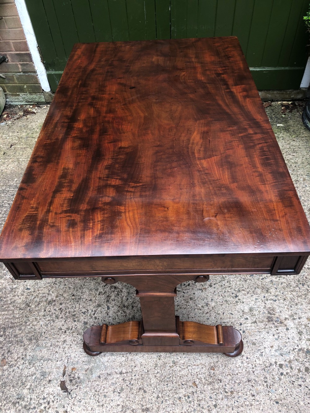 Early C19th George IV period mahogany library or writing table of free-standing form . View XXVII