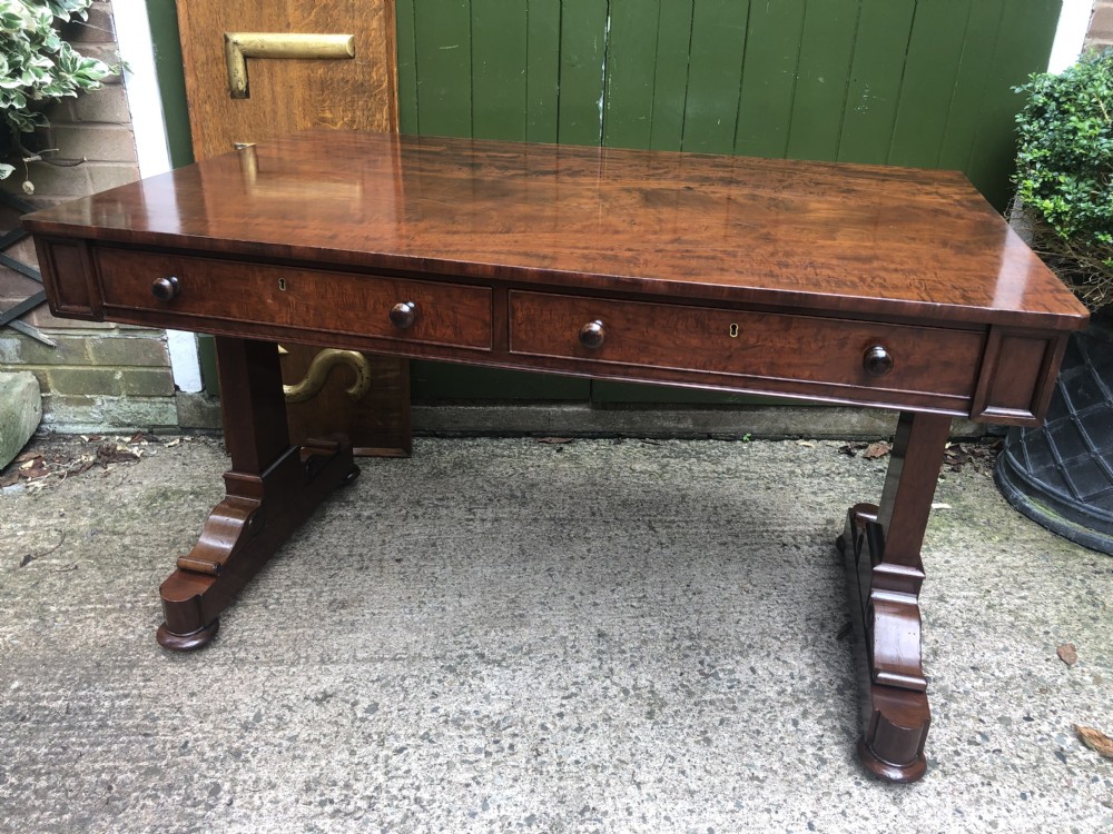 Early C19th George IV period mahogany library or writing table of free-standing form . View XXVIII