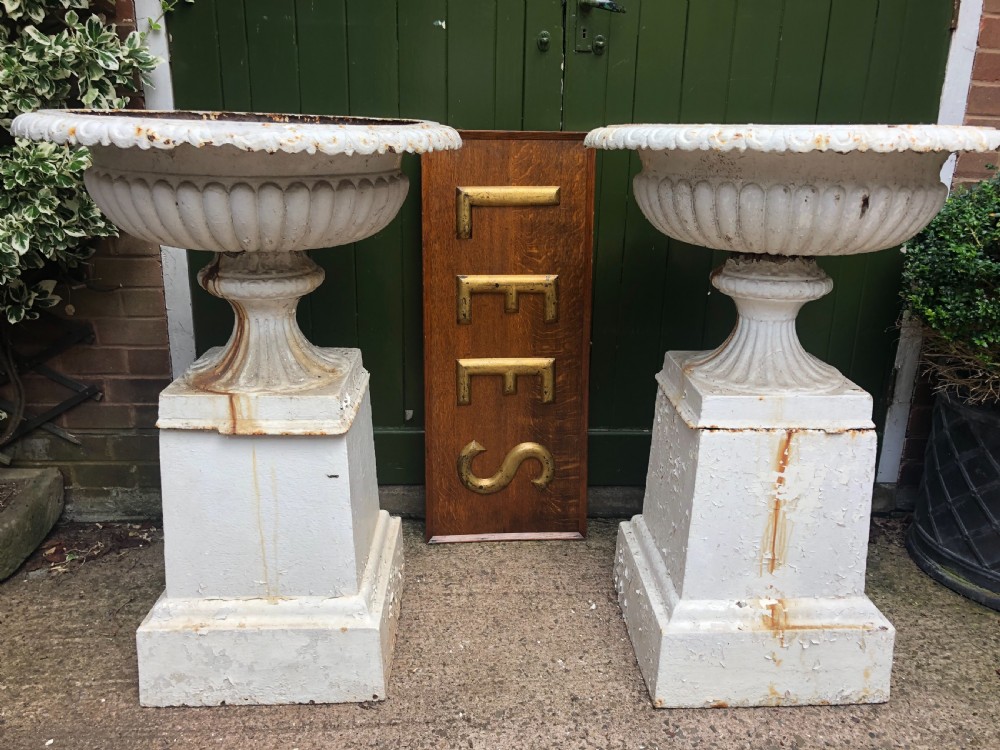 Pair of impressive early C19th cast-iron  terrace or garden vases of imposing scale.