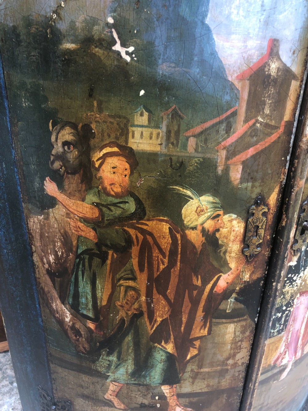 C18th Dutch bow-front hanging corner cupboard decorated with an exotic figural scene. View III