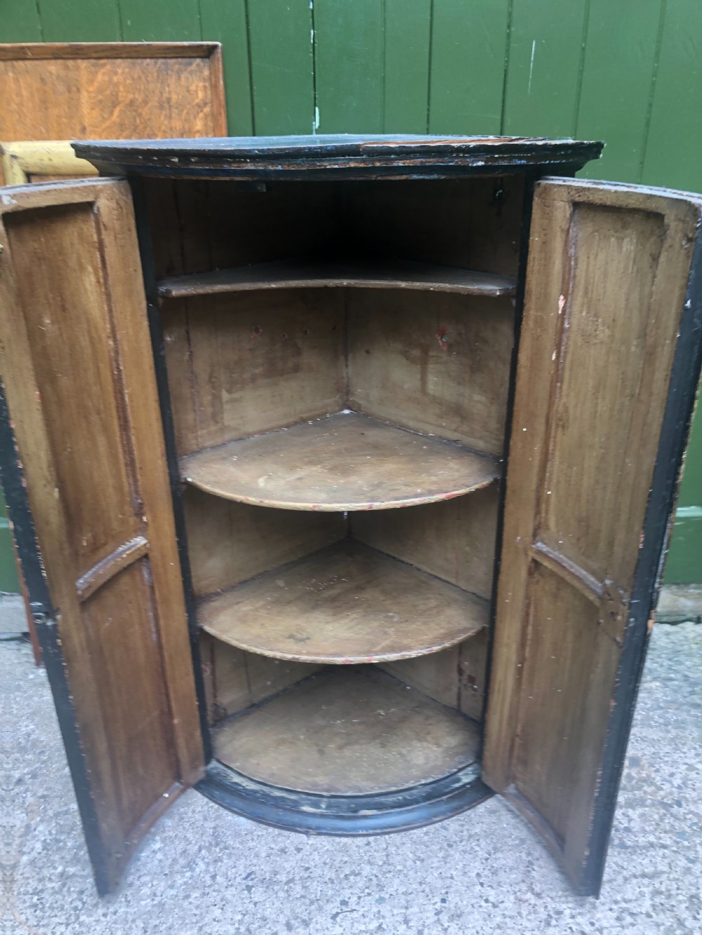 C18th Dutch bow-front hanging corner cupboard decorated with an exotic figural scene. View VI