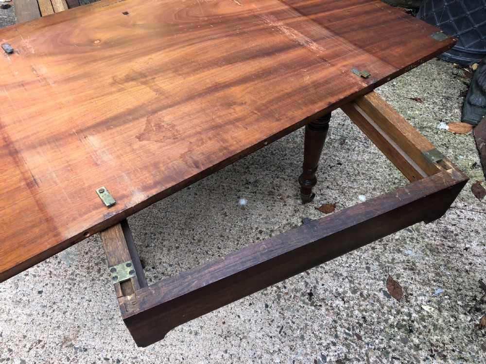 Elegant early C19th Regency period  mahogany extending dining table of unusual design and format. View XII