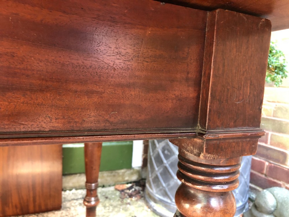 Elegant early C19th Regency period  mahogany extending dining table of unusual design and format. View XIX