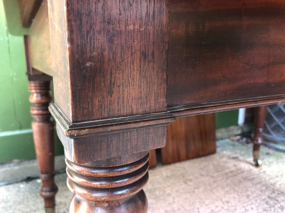Elegant early C19th Regency period  mahogany extending dining table of unusual design and format. View XX