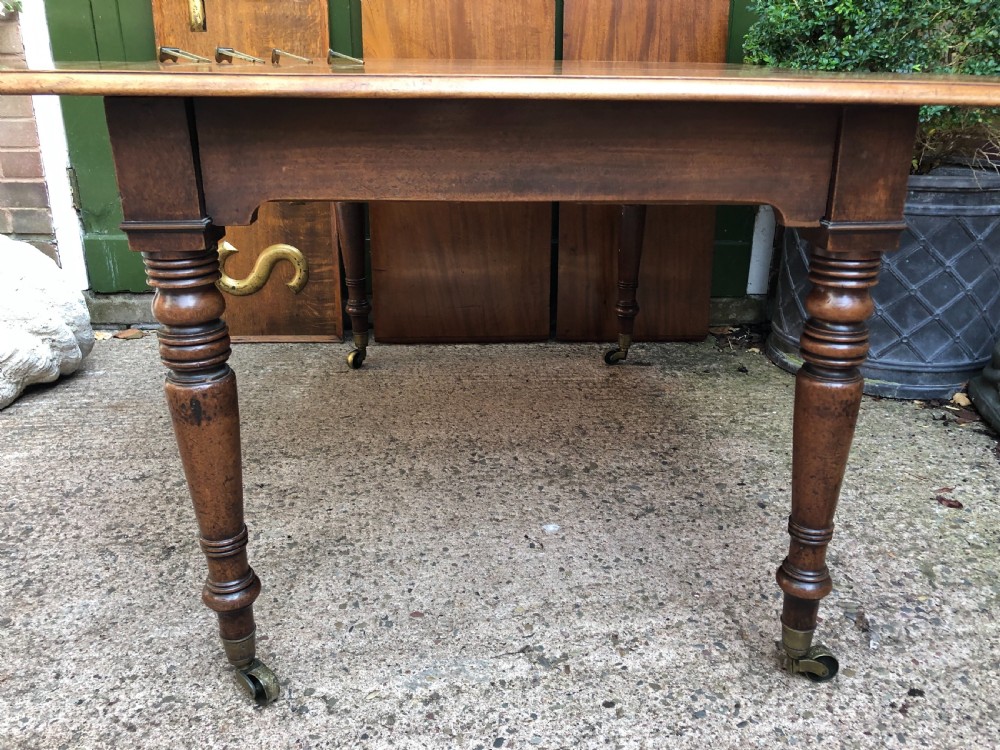 Elegant early C19th Regency period  mahogany extending dining table of unusual design and format. View XXVII
