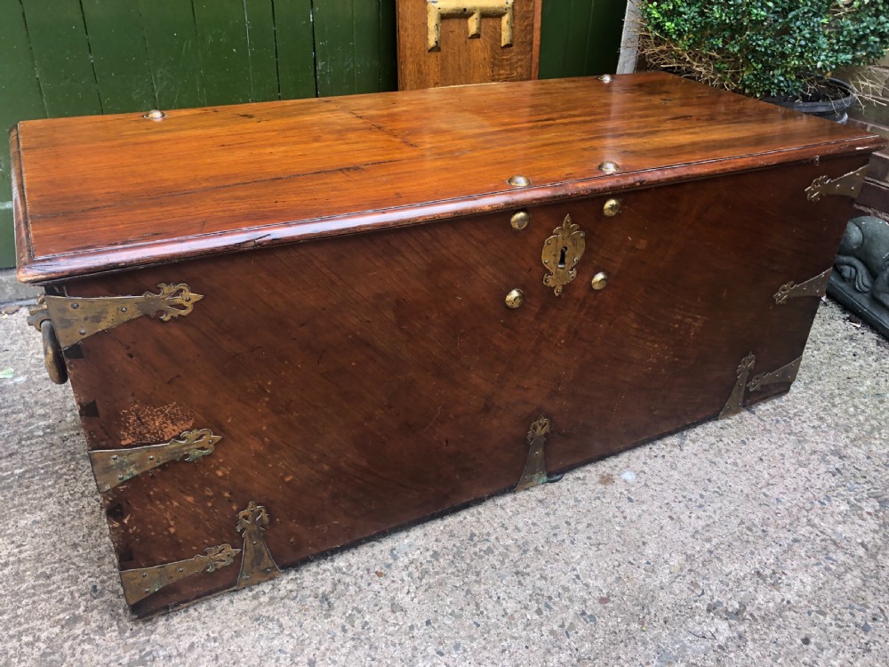 C18th Dutch East Indies teak and cedar chest with gilt-brass and bronze fittings. View XIX