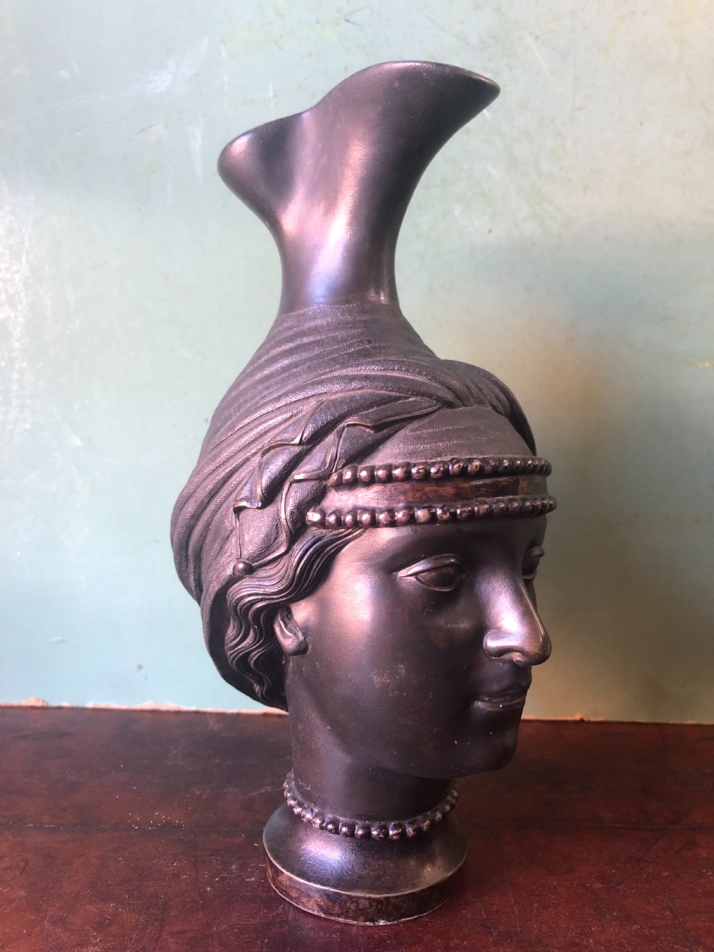 Unusual C19th bronze Etruscan style  ‘Grand Tour’ souvenir type ewer modelled as a bust study of a goddess or perhaps a Vestal Virgin. 
