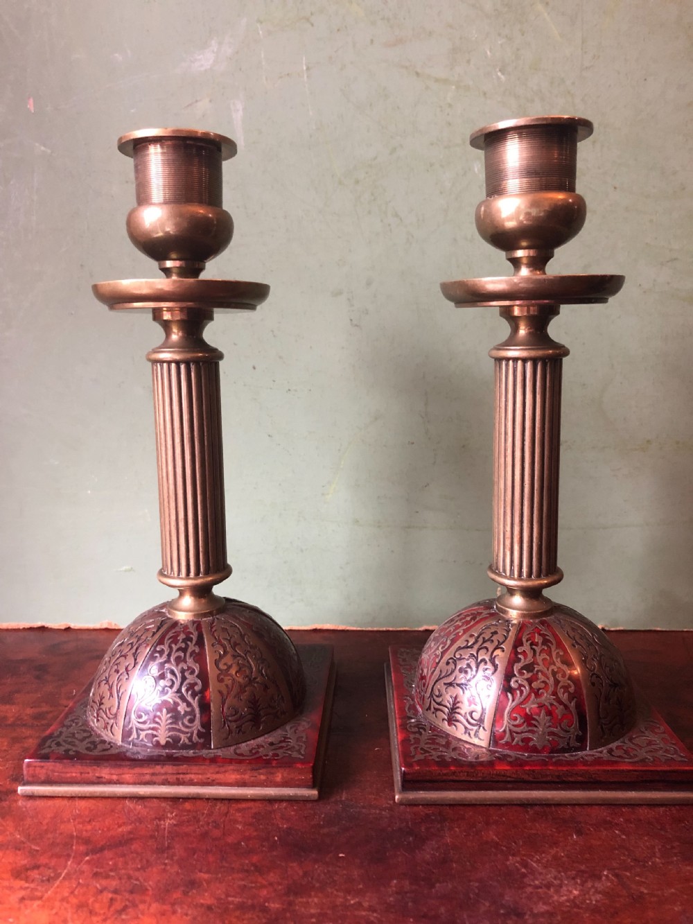 Pair of fine quality late C19th brass and scarlet red tortoiseshell boulle-work candlesticks.