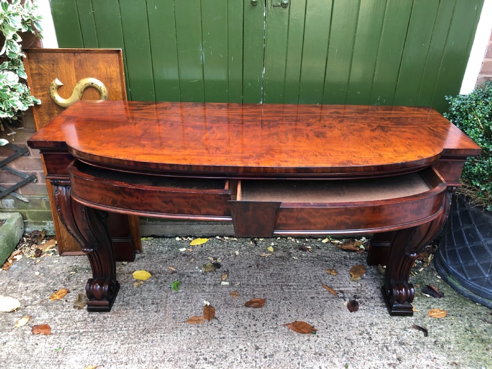Early C19th William IV period figured mahogany console table of bold design. View V