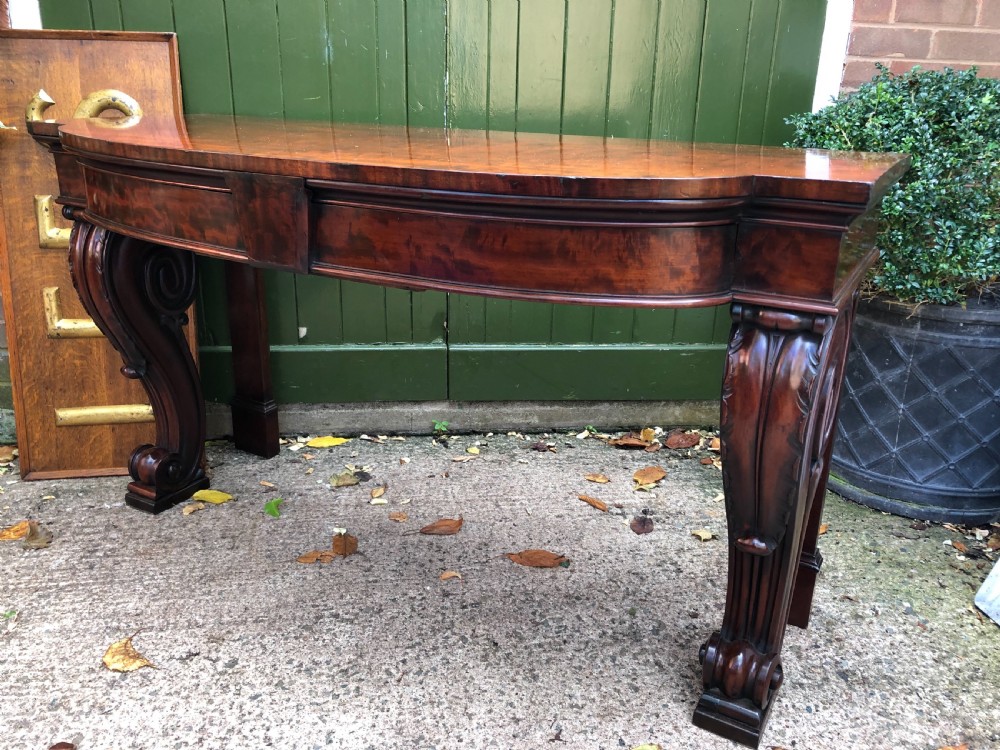 Early C19th William IV period figured mahogany console table of bold design. View IX