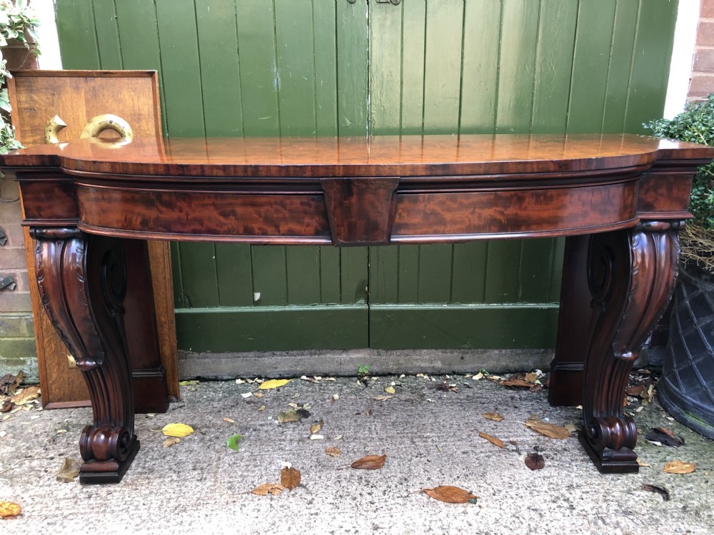 Early C19th William IV period figured mahogany console table of bold design.