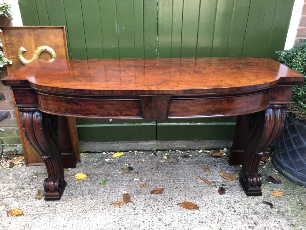 Early C19th William IV period figured mahogany console table of bold design. View XXII
