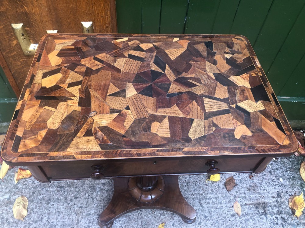Interesting mid C19th rectangular mahogany table with an inlaid specimen-wood top.  View VII
