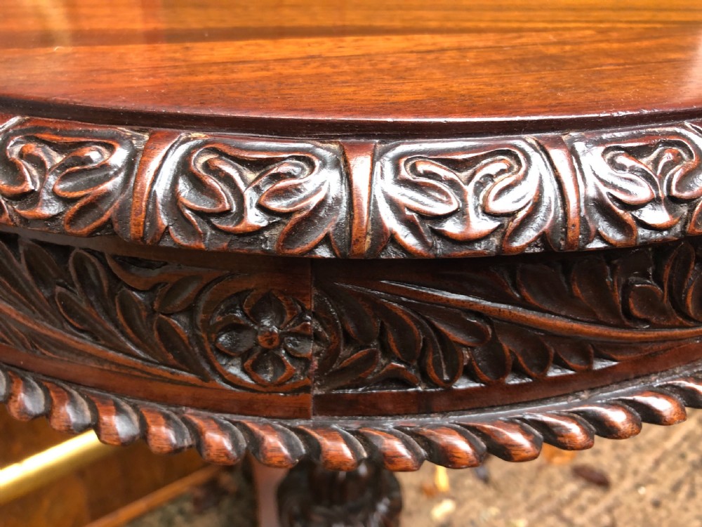 Mid C19th Anglo-Indian heavily-carved rosewood circular pedestal table. View IV