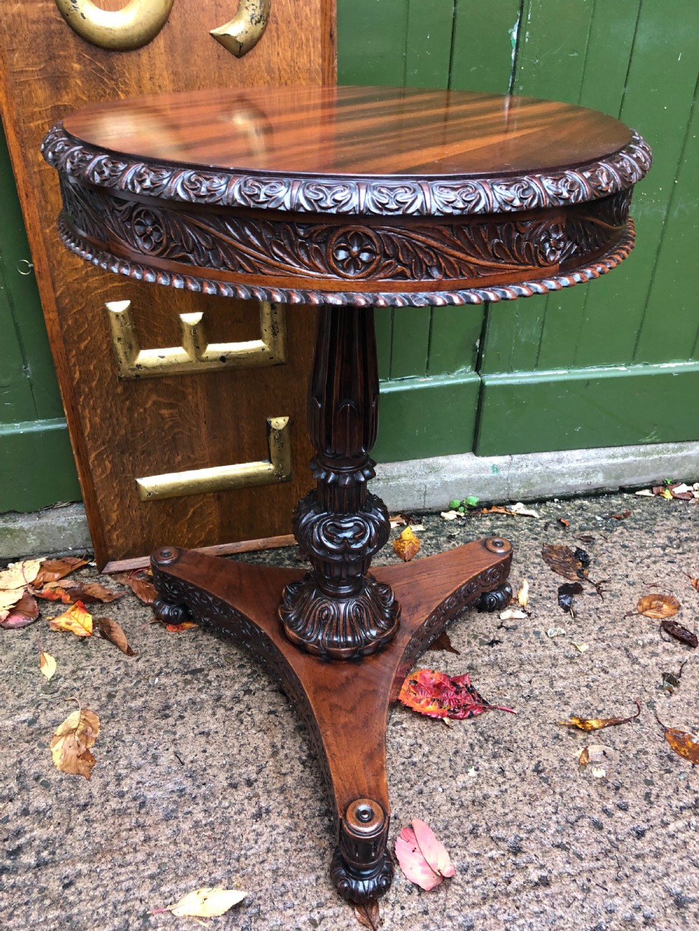Mid C19th Anglo-Indian heavily-carved rosewood circular pedestal table. View VII