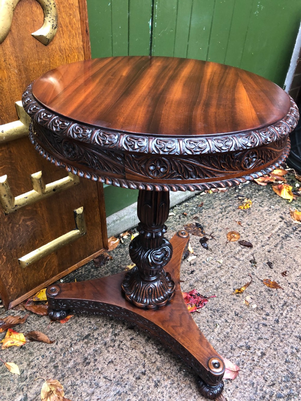 Mid C19th Anglo-Indian heavily-carved rosewood circular pedestal table. View IX