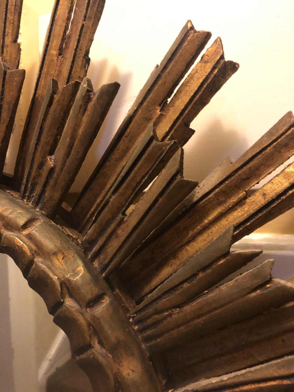 Highly decorative early C20th carved gilt-wood “sunburst” frame circular mirror . View III