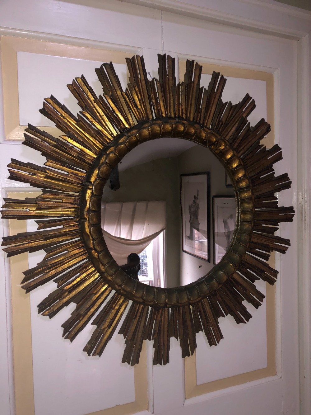 Highly decorative early C20th carved gilt-wood “sunburst” frame circular mirror . View X
