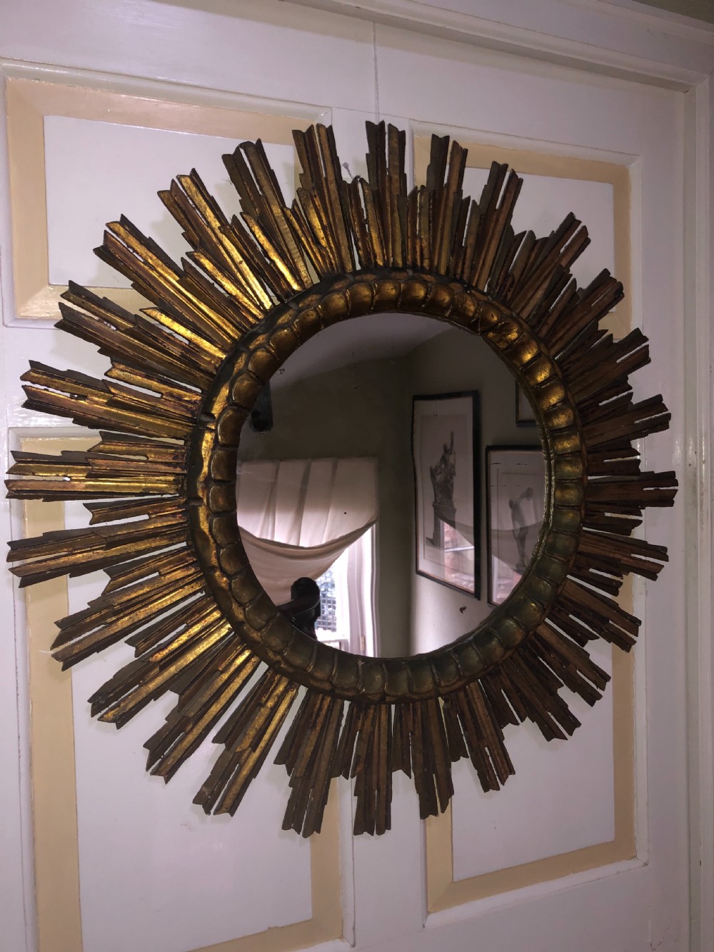 Highly decorative early C20th carved gilt-wood “sunburst” frame circular mirror . View XI