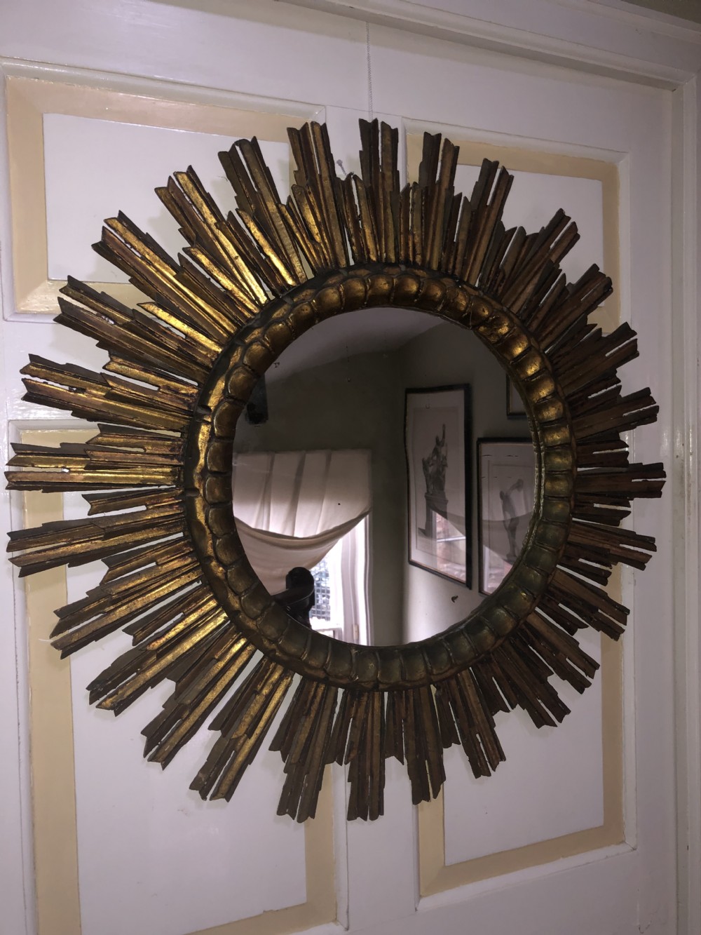 Highly decorative early C20th carved gilt-wood “sunburst” frame circular mirror . View XXIV