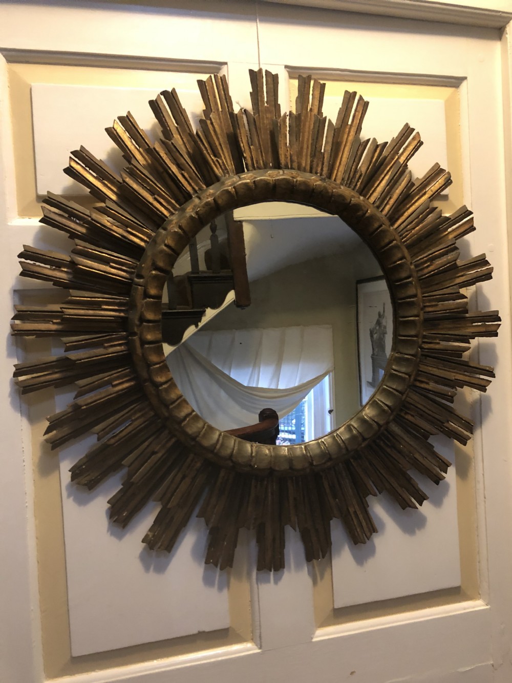 Highly decorative early C20th carved gilt-wood “sunburst” frame circular mirror . View XXV