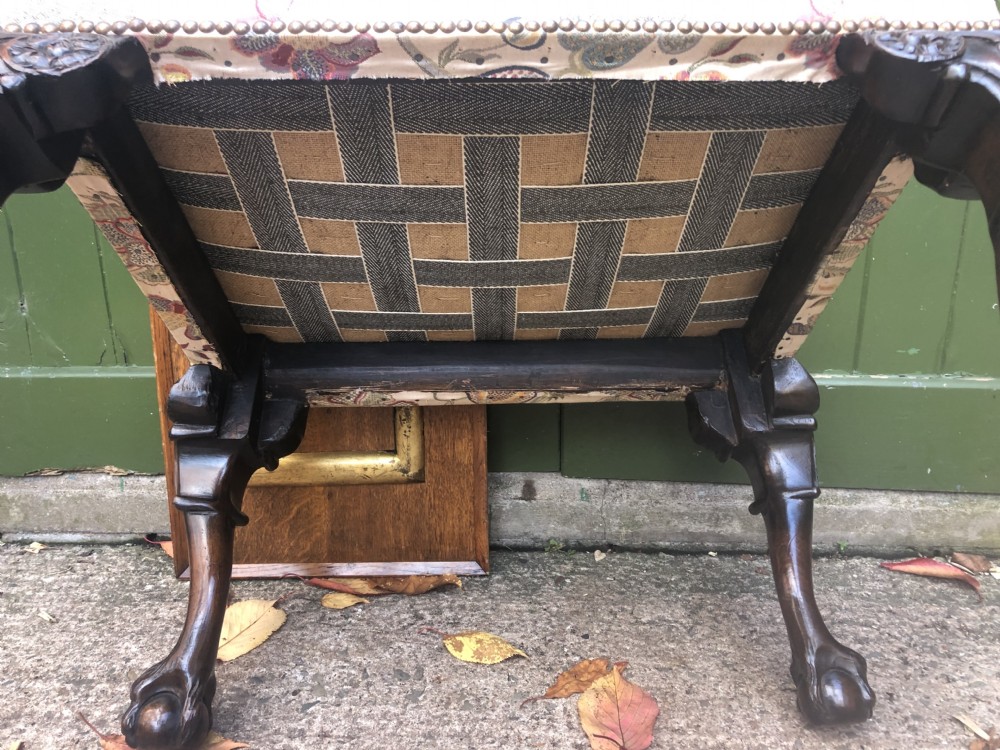 A rectangular floral upholstered stool featuring dark carved walnut cabriole legs with floral knees and claw-and-ball feet. View XIII