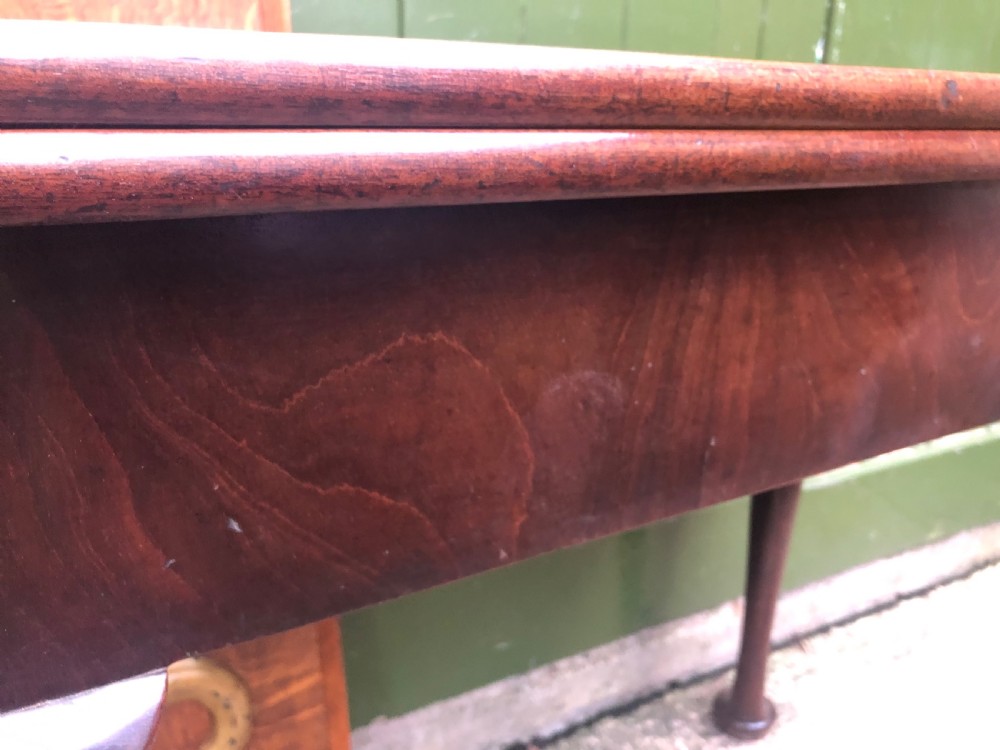 A mid-18th-century George II mahogany fold-over gaming table featuring elegant cabriole legs with pad feet. View XI
