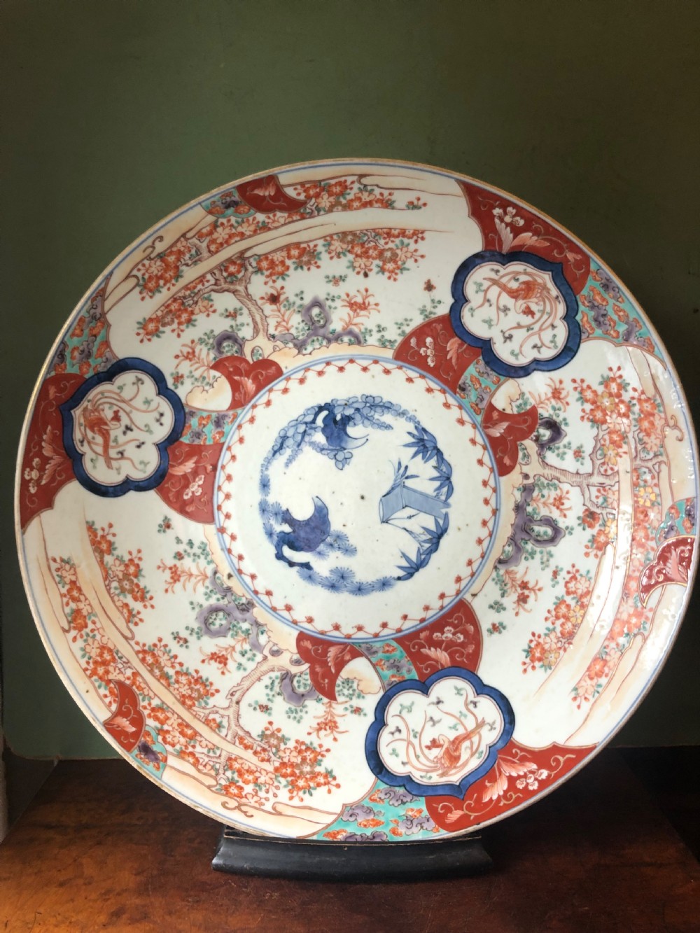 Mid C19th Japanese porcelain dished charger decorated in the Imari palette. View II