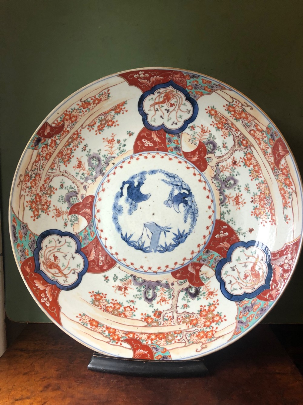 Mid C19th Japanese porcelain dished charger decorated in the Imari palette. View III