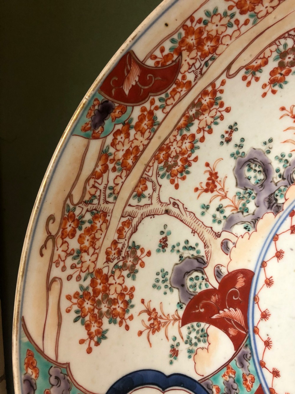 Mid C19th Japanese porcelain dished charger decorated in the Imari palette. View IV