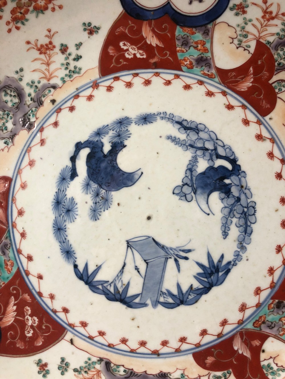 Mid C19th Japanese porcelain dished charger decorated in the Imari palette. View V