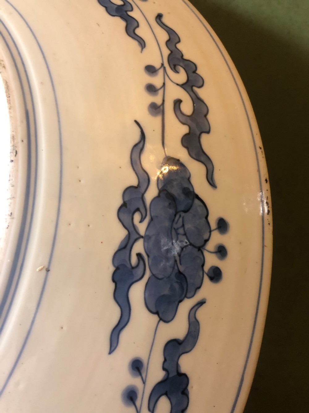 Mid C19th Japanese porcelain dished charger decorated in the Imari palette. View IX