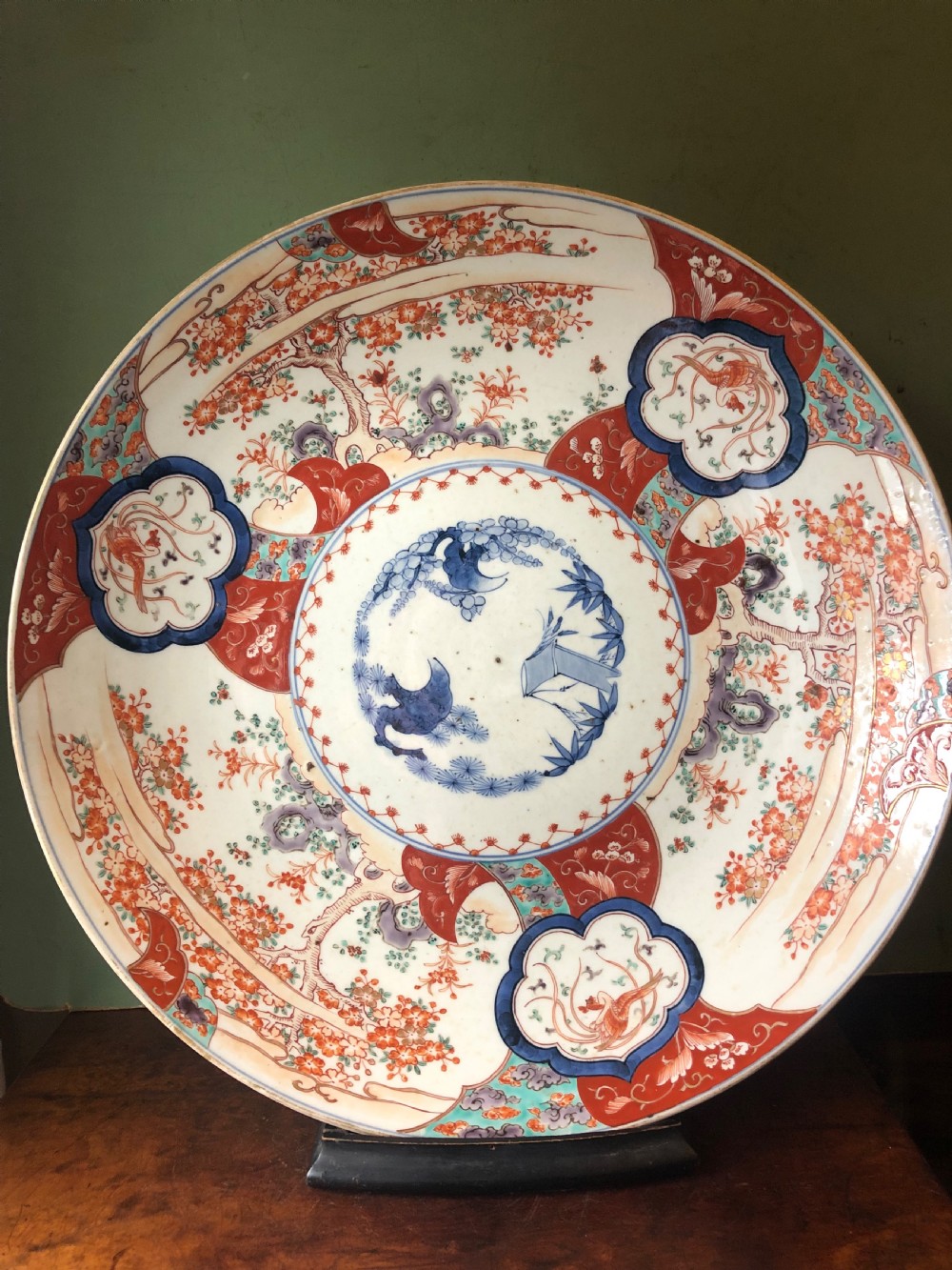 Mid C19th Japanese porcelain dished charger decorated in the Imari palette. View XI