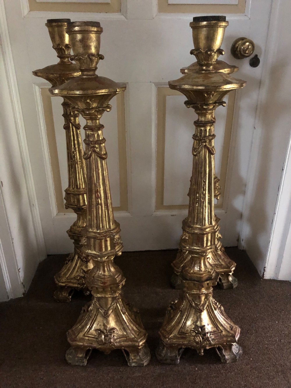 Impressive set of four C18th carved gilt-wood altar-type candlesticks. View II