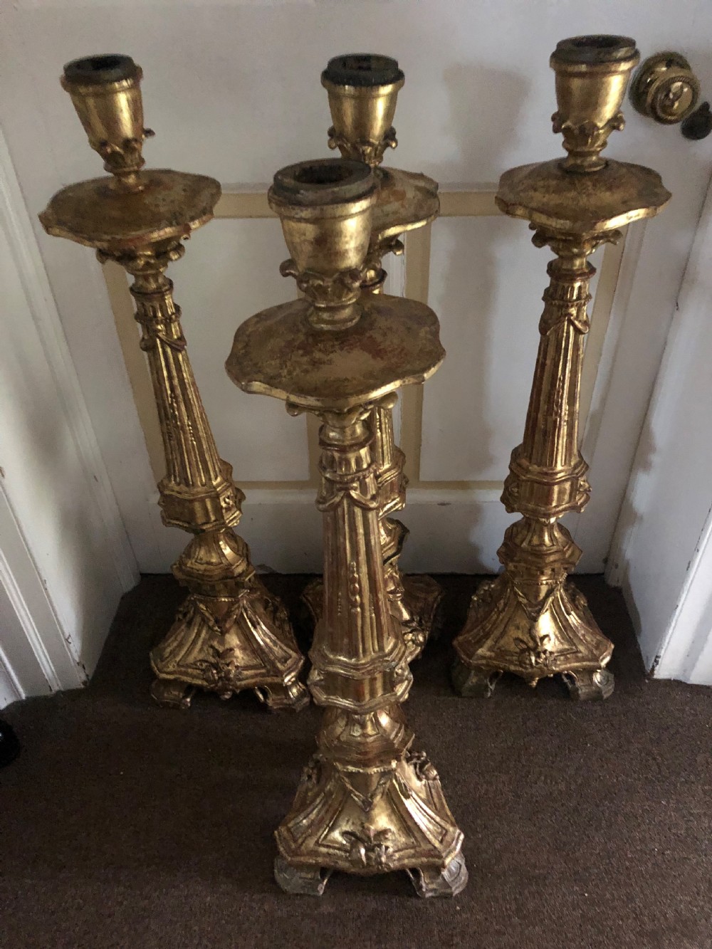 Impressive set of four C18th carved gilt-wood altar-type candlesticks. View III