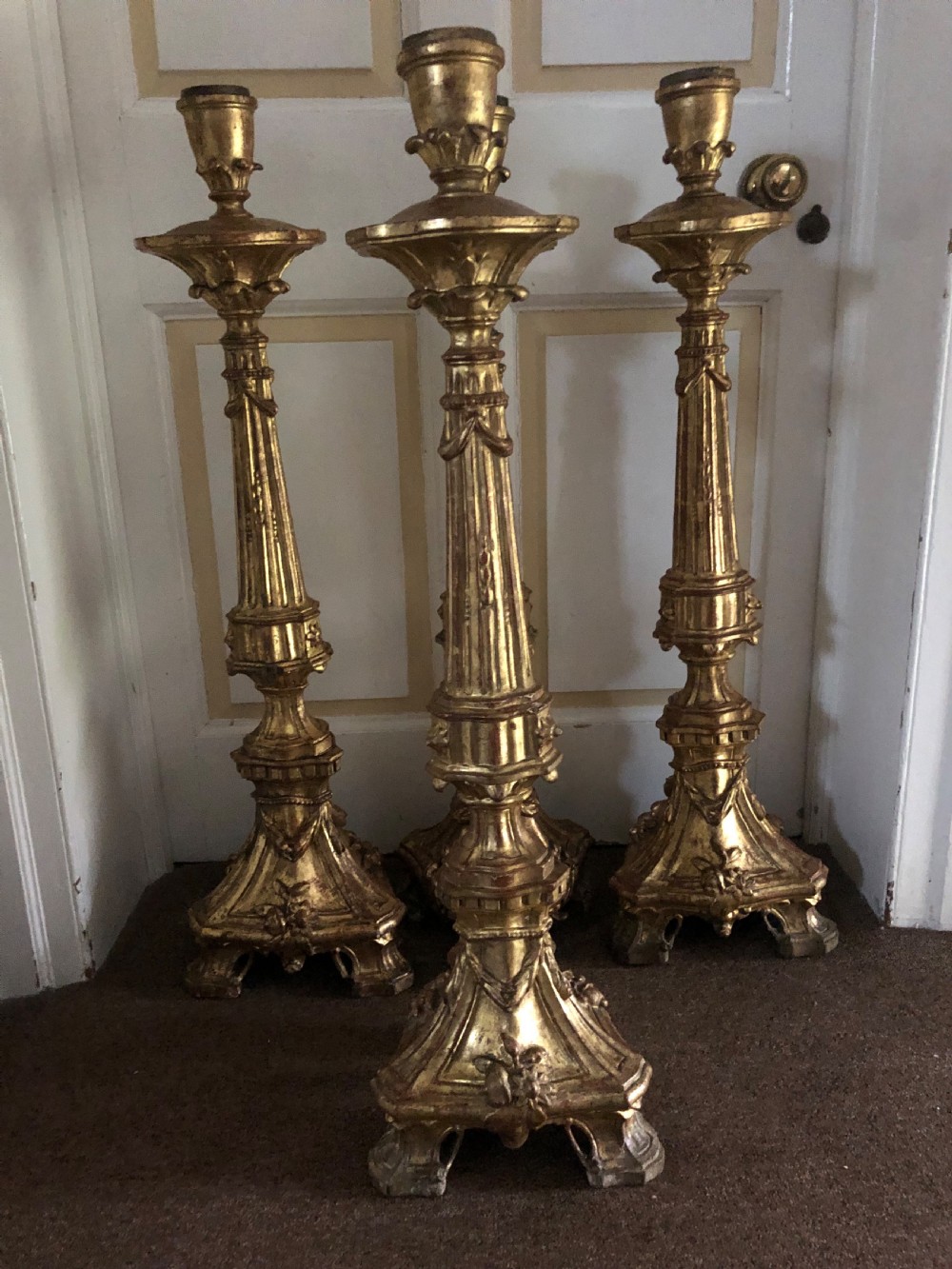 Impressive set of four C18th carved gilt-wood altar-type candlesticks. View IV