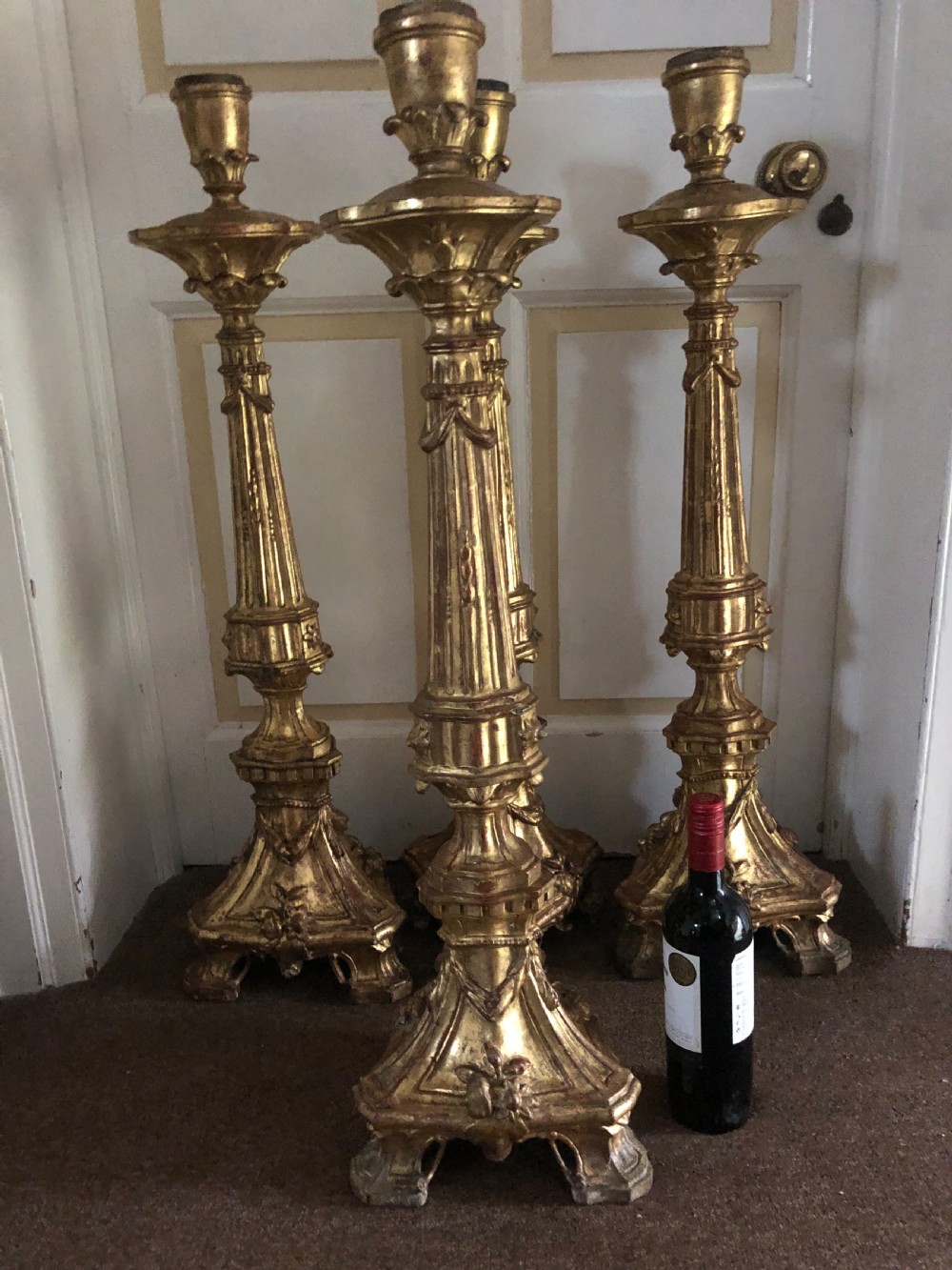 Impressive set of four C18th carved gilt-wood altar-type candlesticks. View V