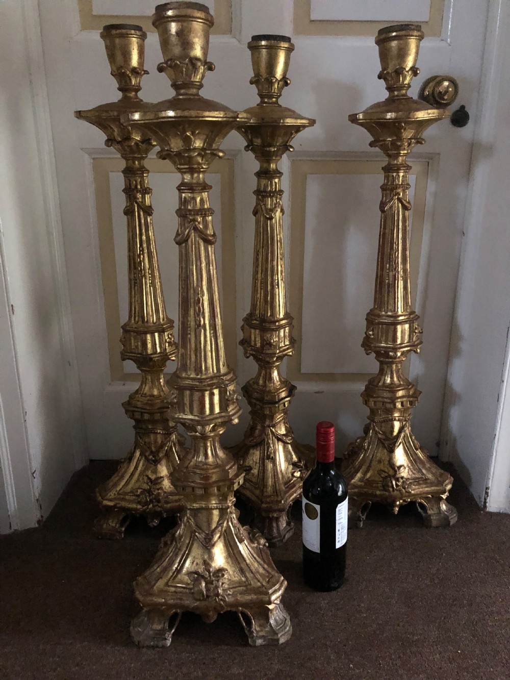 Impressive set of four C18th carved gilt-wood altar-type candlesticks. View VI