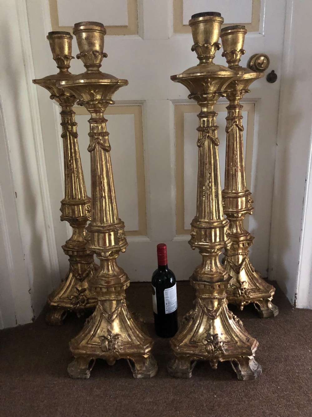 Impressive set of four C18th carved gilt-wood altar-type candlesticks. View VII