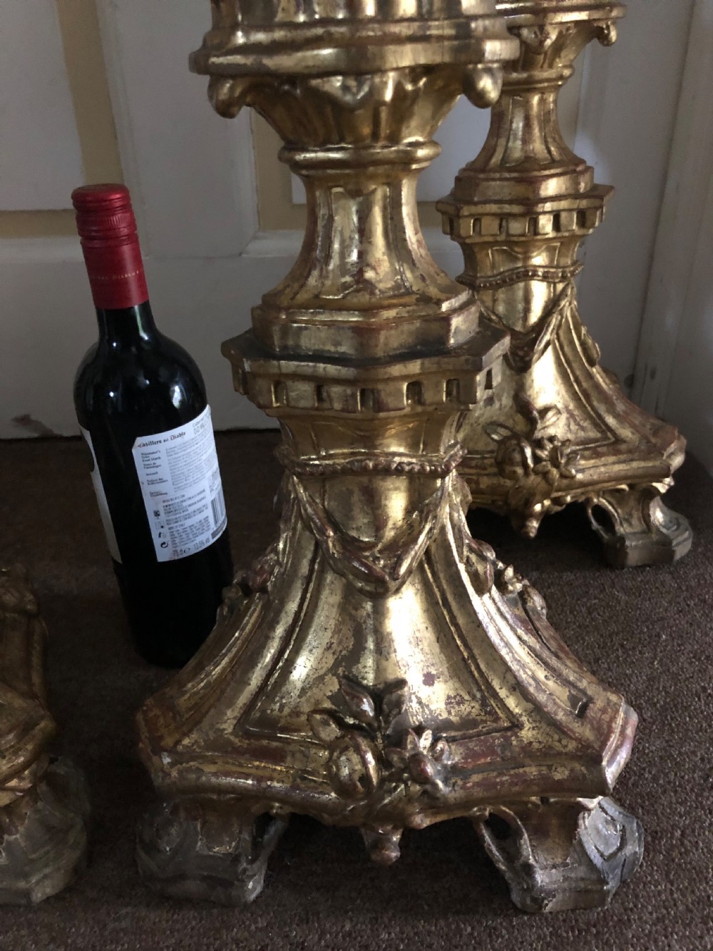Impressive set of four C18th carved gilt-wood altar-type candlesticks. View VIII