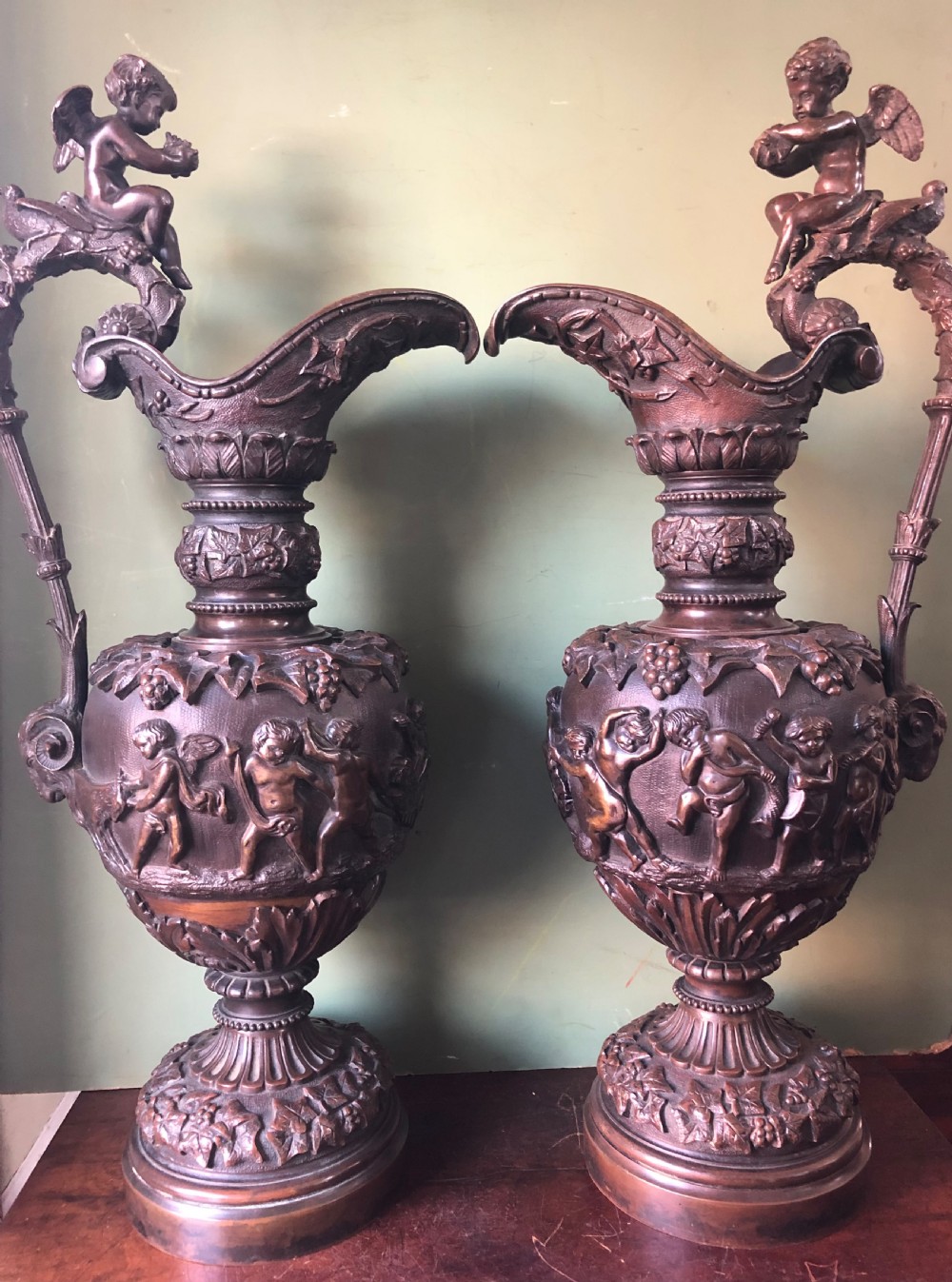 Pair of large mid C19th Italianate cast bronze ewers in the Renaissance revival style.