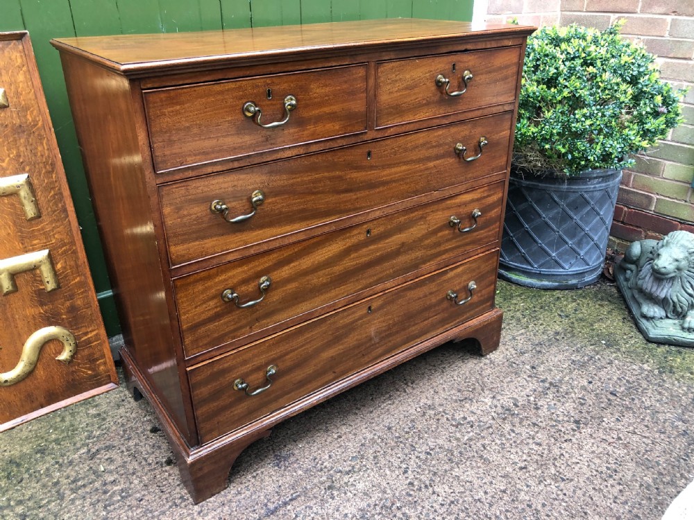 Late C18th George III period mahogany chest of drawers. View II