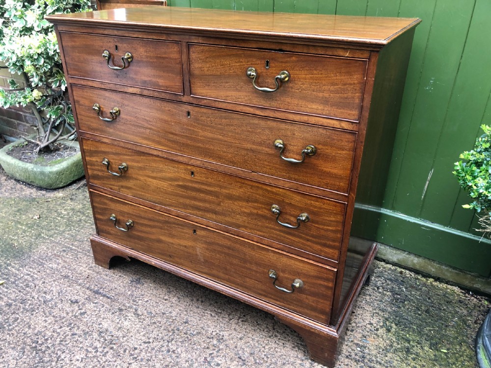 Late C18th George III period mahogany chest of drawers. View IV